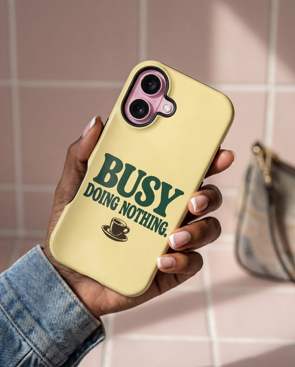 Busy Doing Nothing iPhone case, in hand